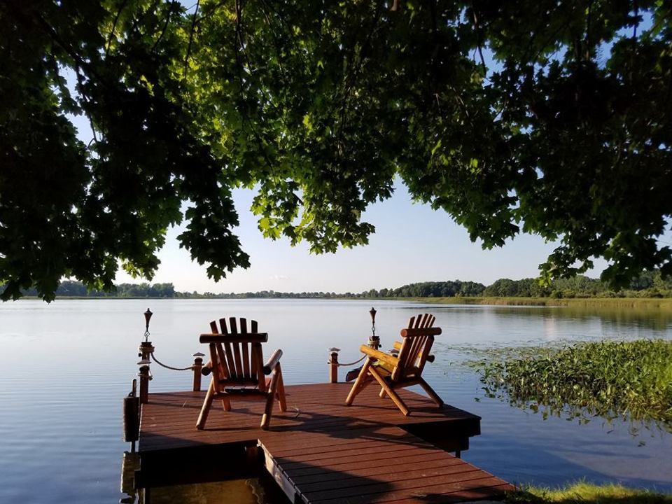 The lakeside Dock with the much loved and photographed log chairs
